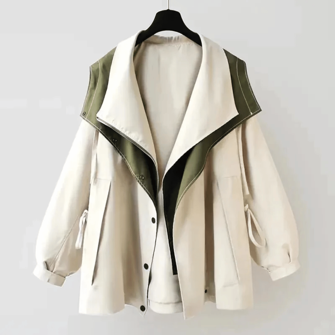 Chubasquero de mujer con cremallera alta, moda femenina, ideal para el entretiempo ligero.