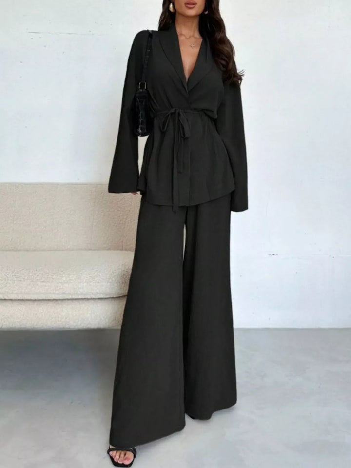 Conjunto formal mujer: Top con lazo decorativo y pantalón ancho. Ideal para eventos.