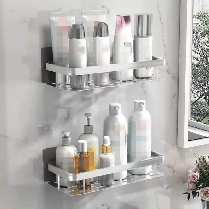 Estante adhesivo moderno para el baño. Sin taladros, ofrece una solución de almacenaje elegante y duradera.