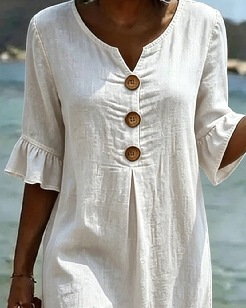 Vestido de verano, fluido y casual para mujer. Destaca por sus elegantes mangas acampanadas. Ropa de moda.