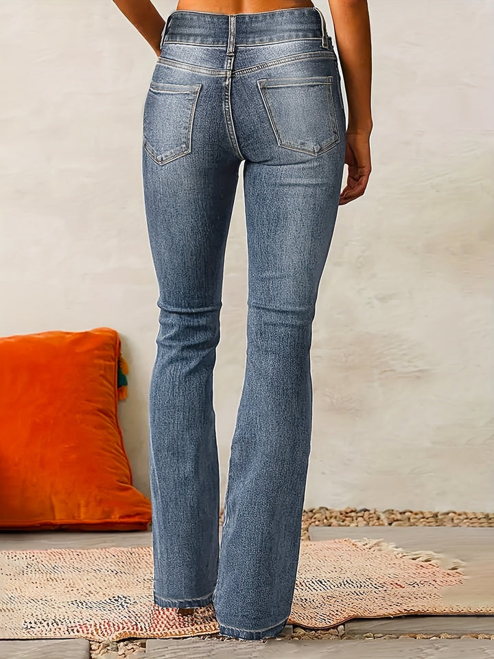 Elegantes flare jeans de talle alto para mujer. Vaqueros acampanados con doble botón, estilo vintage.