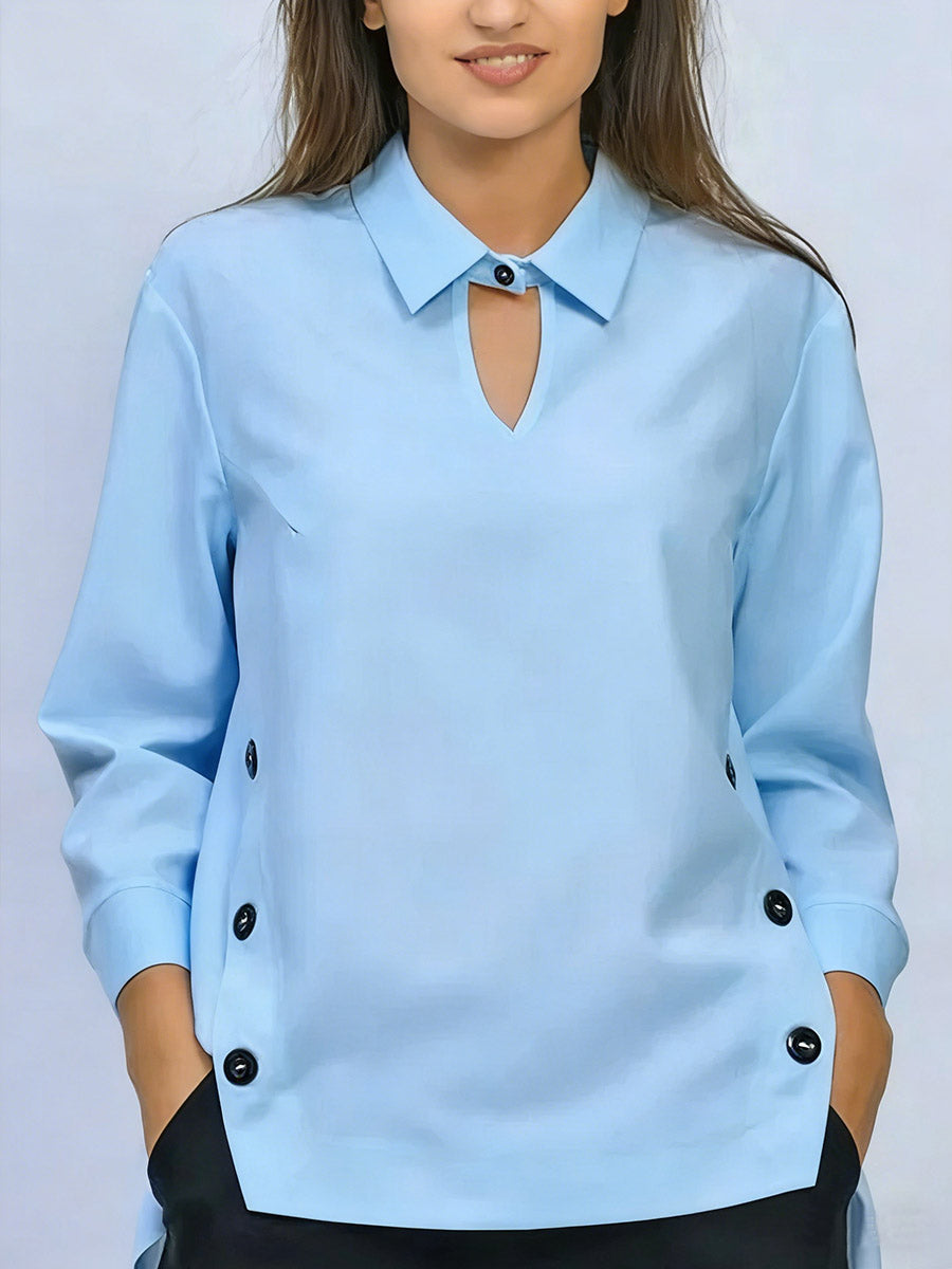 Moda femenina: blusa de algodón con cuello solapa y manga larga. Un estilo versátil para la mujer moderna.