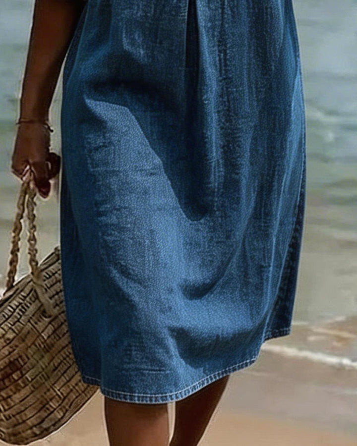 Vestido ligero y fluido para mujer con mangas acampanadas. Ideal para un estilo casual y fresco de verano.