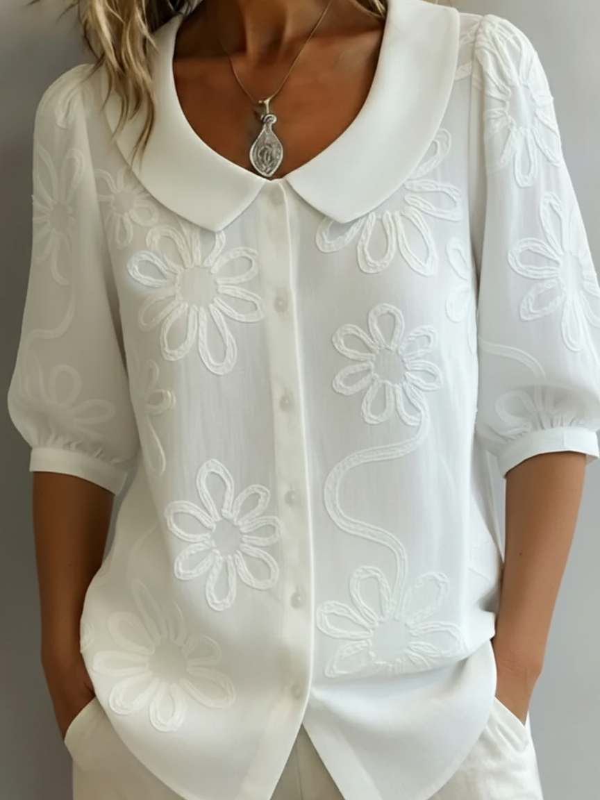 Blusa elegante floral para mujer, diseño versátil para uso diario o casual en primavera/verano.