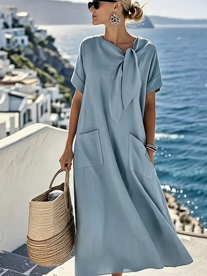 Vestido midi de verano fluido para mujer, cuello redondo, manga corta. Ideal para comodidad, playa y vacaciones. Ropa casual.
