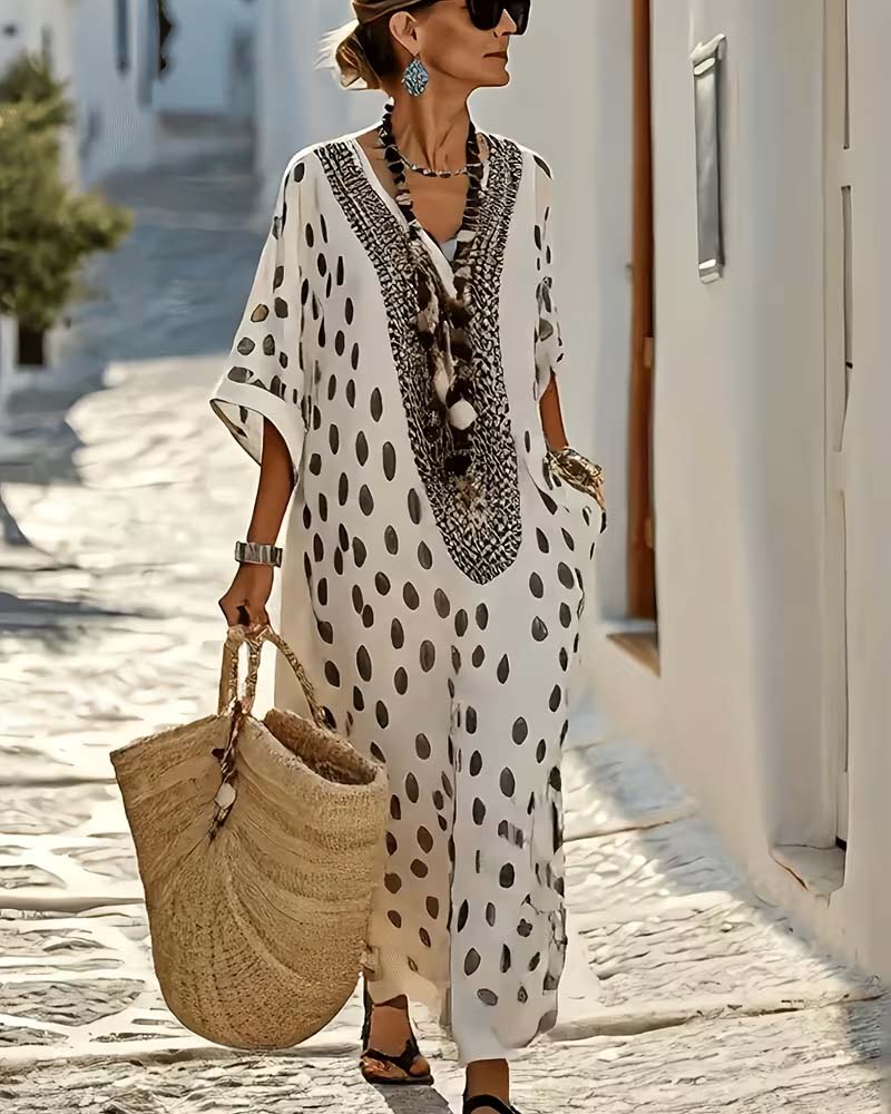 Vestido maxi kaftán casual elegante de mujer, con lunares y bordado étnico. Estilo fluido para el verano.
