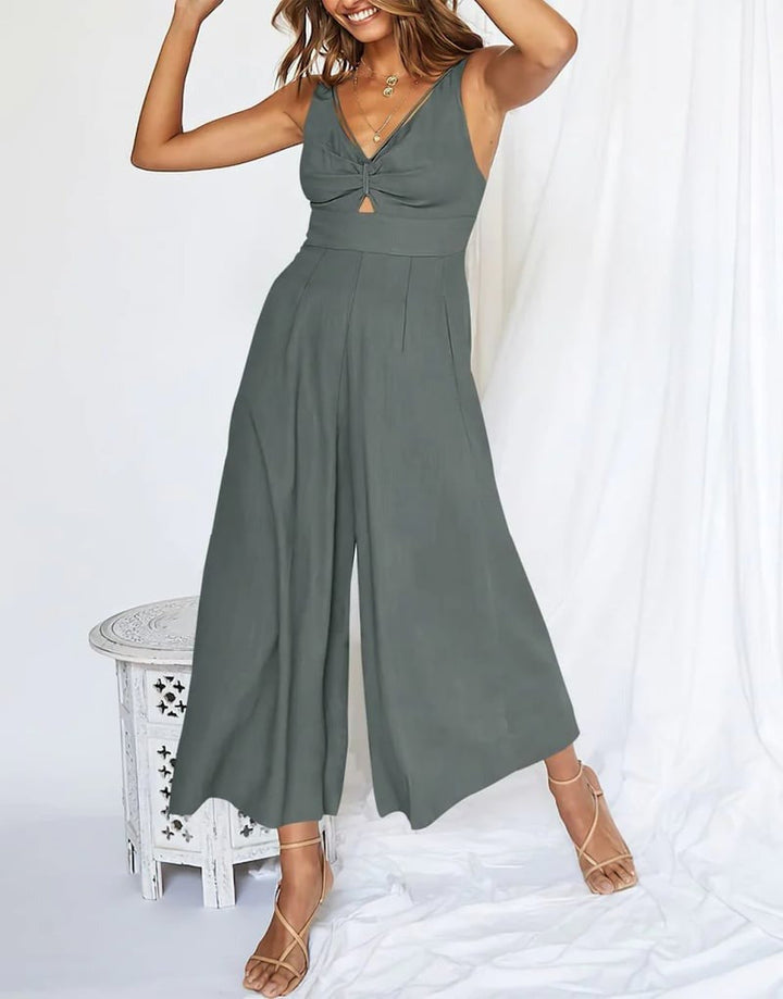Jumpsuit verde esmeralda sin mangas, escote V. Ideal para fiesta, moda femenina de invitada.