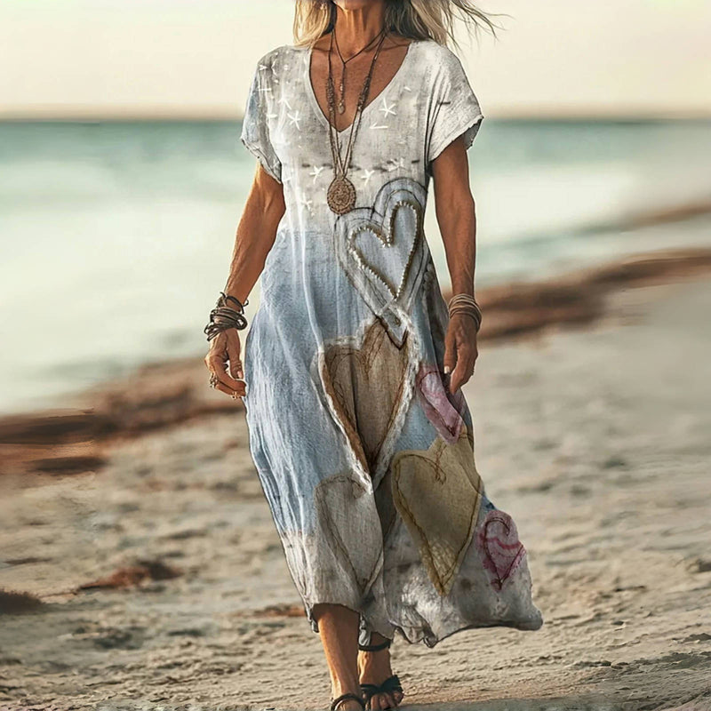 Vestido midi fluido casual de mujer con estampado de corazones y escote en V, moda primavera verano.