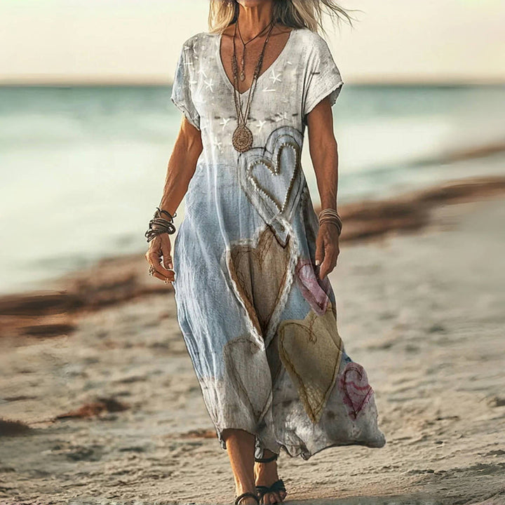 Vestido midi fluido casual de mujer con estampado de corazones y escote en V, moda primavera verano.