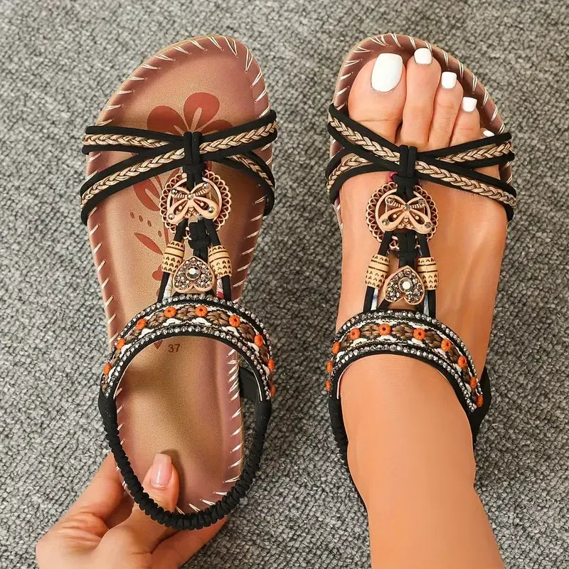 Sandalias planas para mujer con ajuste elástico, ofrecen comodidad superior. Perfectas para pasear y vacaciones.