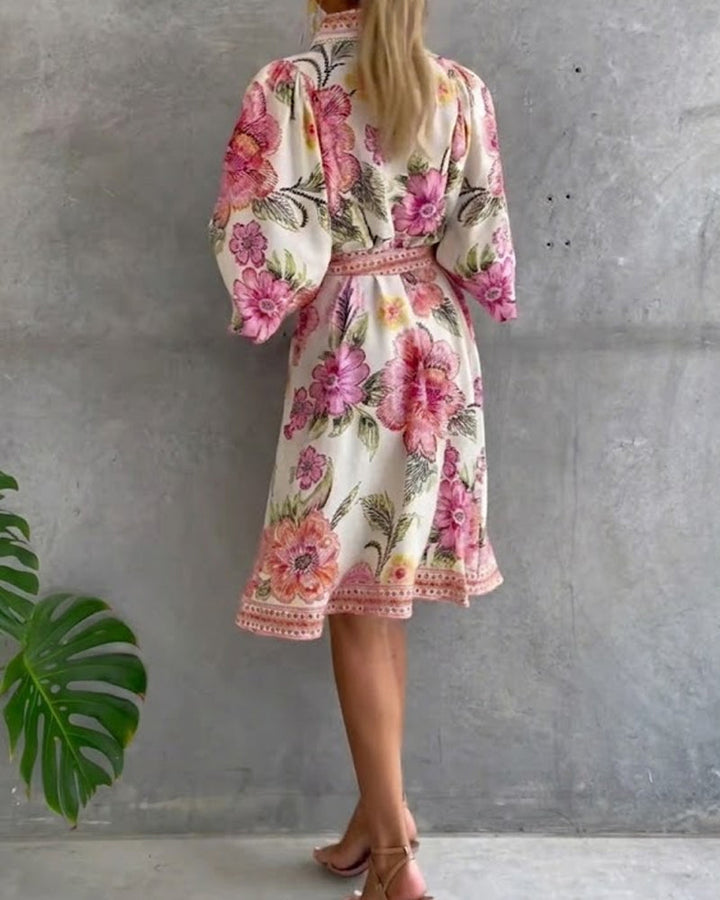 Vestido elegante con estampado floral, mangas farol y cierre de botones para mujer.