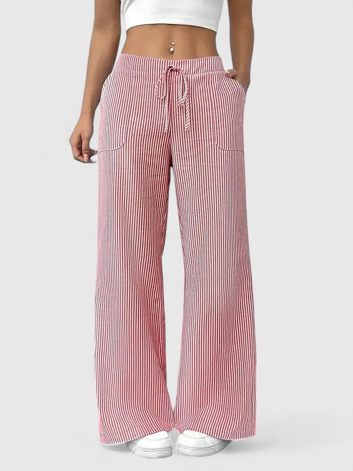 Conjunto casual con pantalón ancho rosa de mujer, cintura ajustable y tejido ligero.