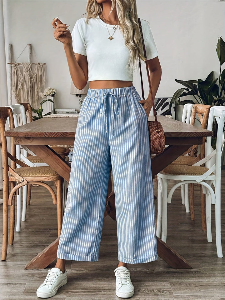 Pantalón fluido de rayas para mujer, cómodo y ligero, con cintura ajustable. Ideal para primavera y verano.