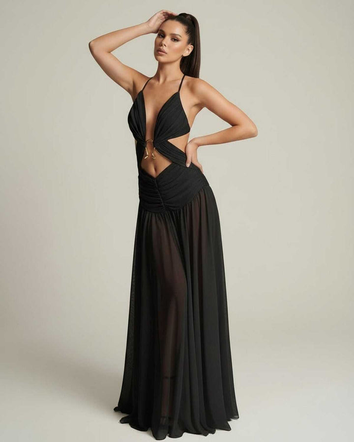 Atractivo vestido maxi negro para mujer con escote en V y aberturas cut-out, ideal para fiesta de gala.