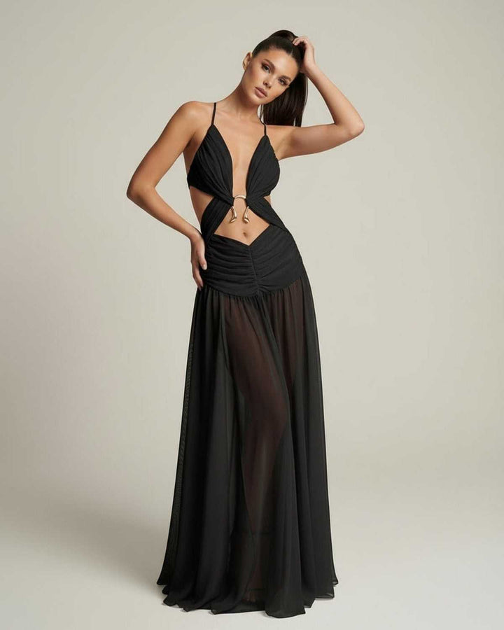 Moda: vestido maxi negro femenino con escote V y estilo cut-out, ideal para lucir elegante en la noche.