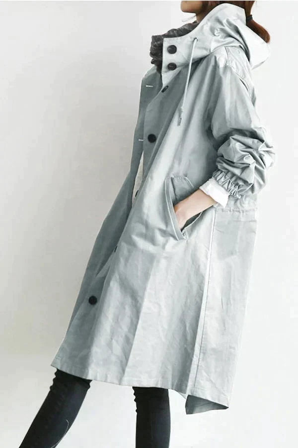 Trench coat impermeable oversize de mujer, combina moda y funcionalidad para el otoño y la primavera.