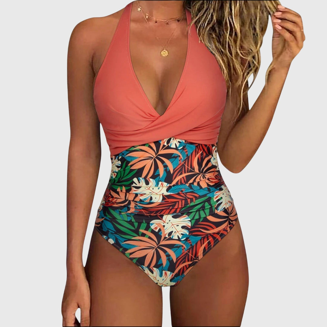 Moda baño mujer: bañador entero halter con escote V profundo, diseño floral fruncido. Moldeador para verano.