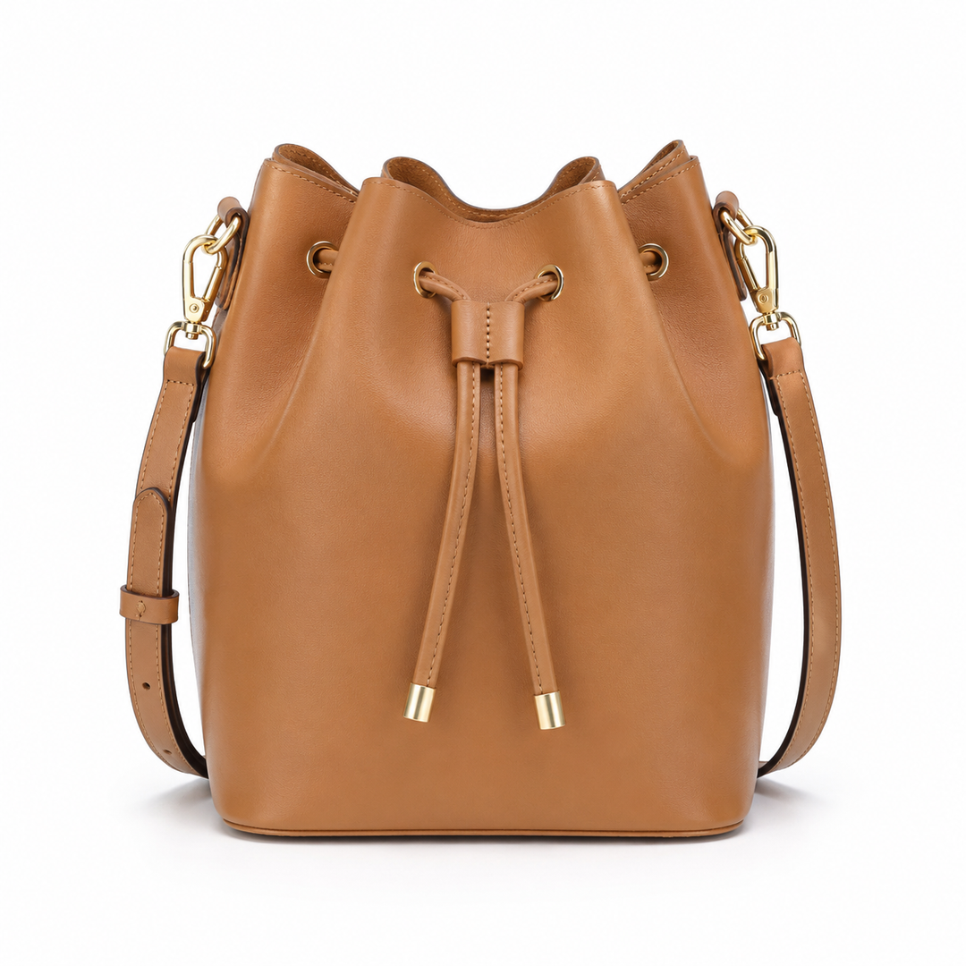 Bolso de cuero elegante tipo cubo para mujer, accesorio de moda versátil.