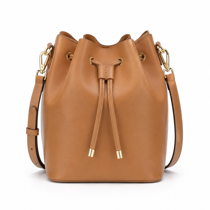 Bolso de cuero elegante tipo cubo para mujer, accesorio de moda versátil.