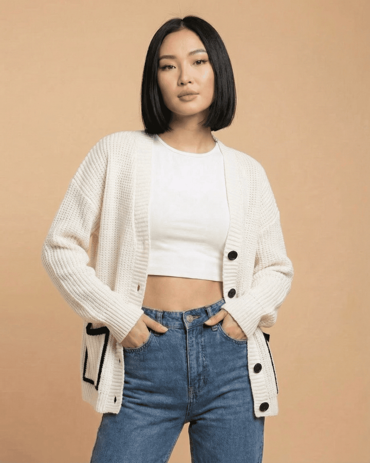Cárdigan de punto femenino con cuello V y bloques de color, perfecto para superposición en otoño-invierno.
