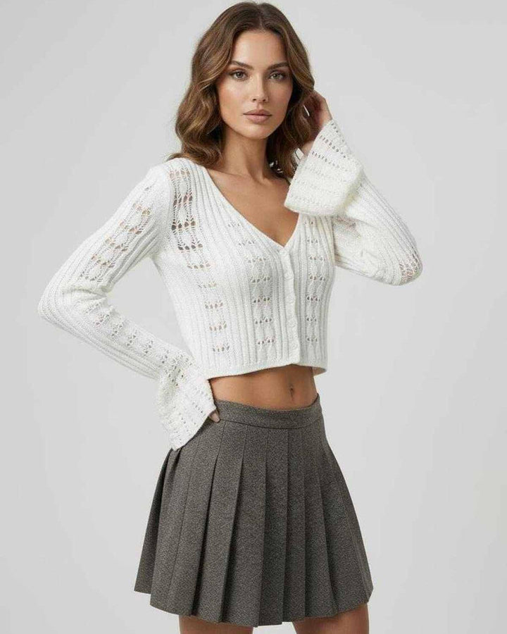 Cárdigan blanco versátil para mujer, estilo corto y elegante. Suéter de moda para diversas ocasiones. Manga larga.