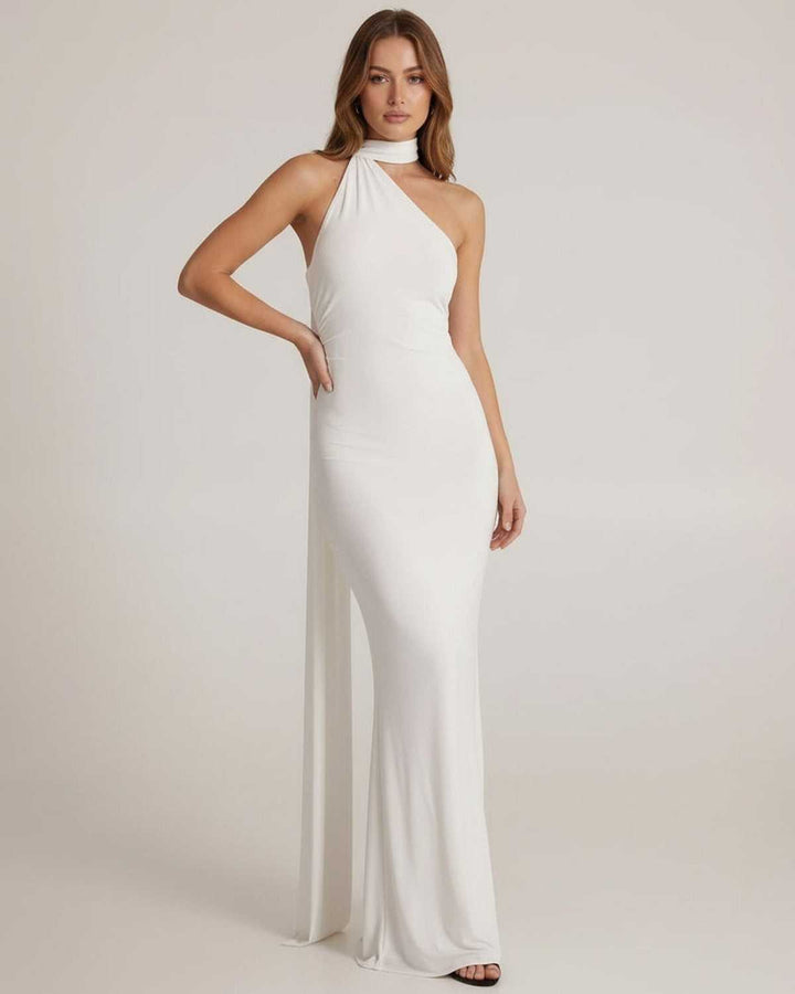Vestido blanco puro maxi Elara, escote halter y espalda abierta. Un diseño elegante para ocasiones especiales de moda.