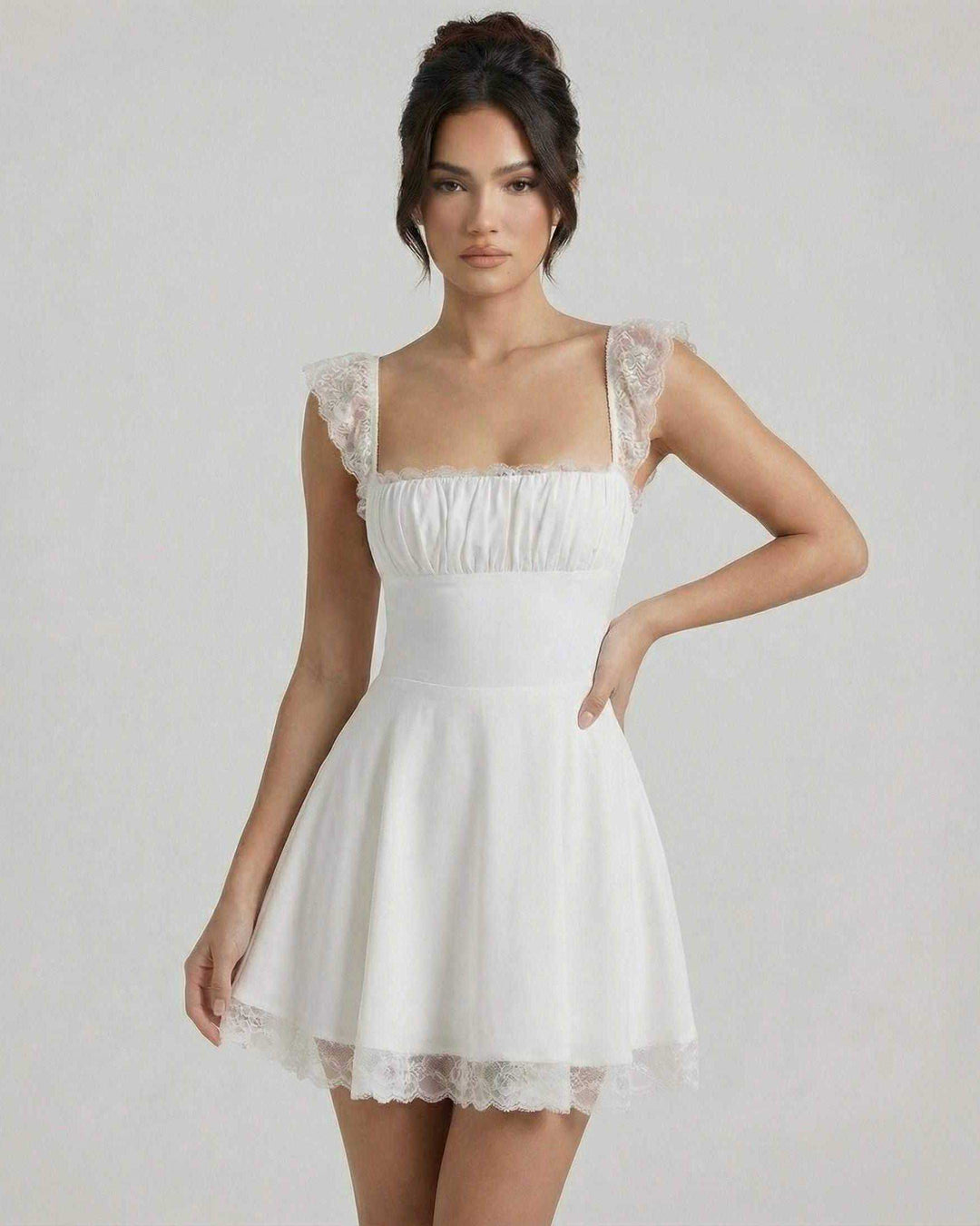 Moda mujer: Vestido mini A-line blanco con corsé estructurado, un toque vintage y elegante para eventos.