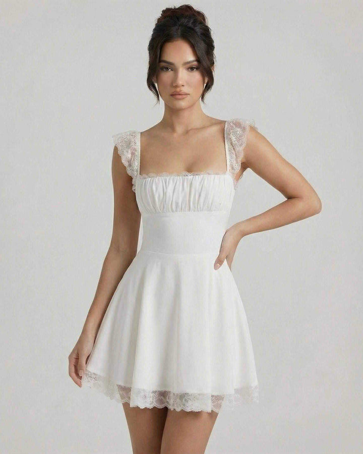 Moda mujer: Vestido mini A-line blanco con corsé estructurado, un toque vintage y elegante para eventos.