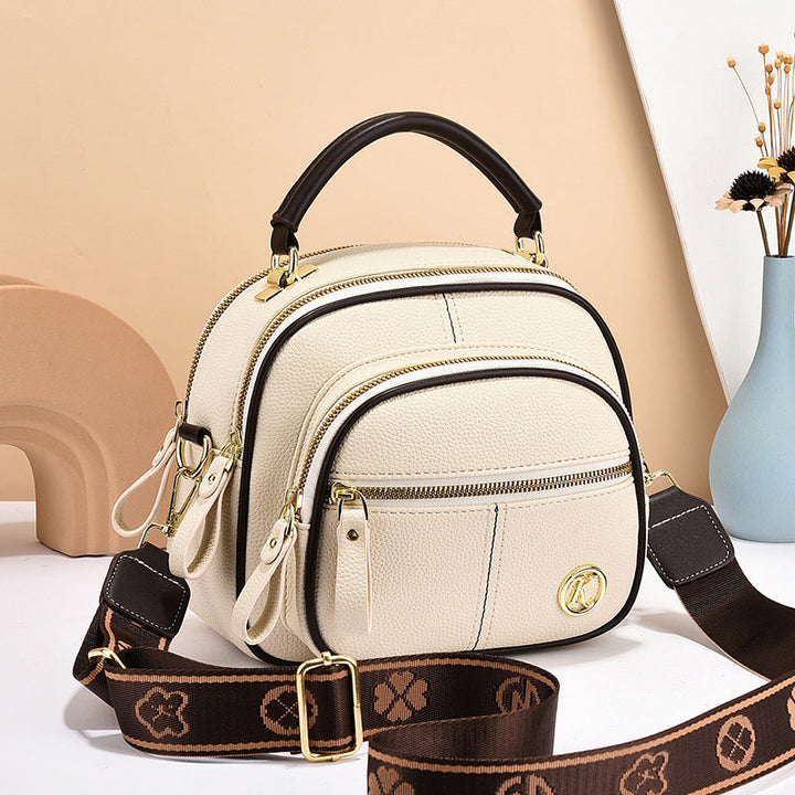 Bolso cruzado azul marino para damas. Un toque de color elegante para tu moda.