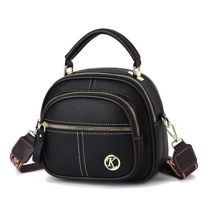 Bolso de mano cruzado para mujeres, diseño compacto. Versátil para salir.