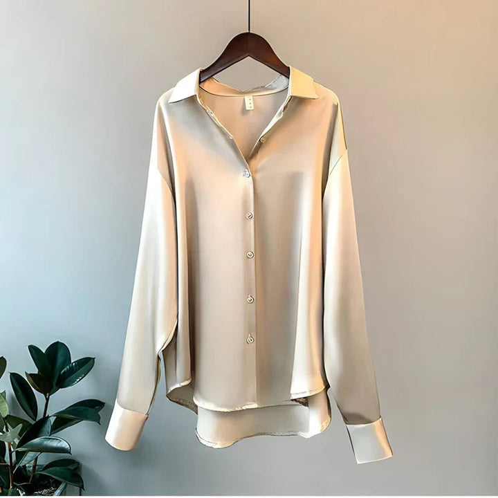 Blusa de seda de manga larga para mujer, elegante y casual chic. Tejido suave, ideal para oficina o fiesta.
