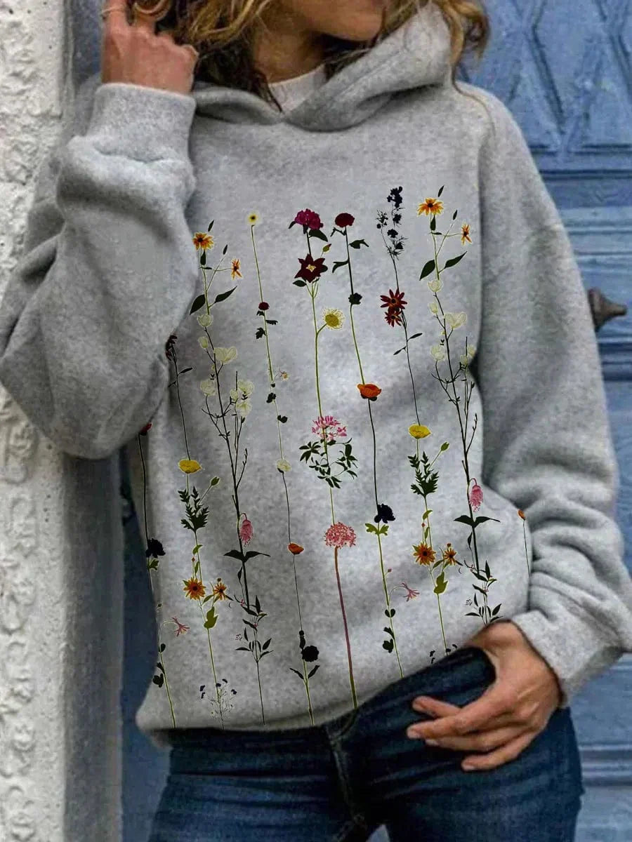 Sudadera floral con capucha para mujer, elegante y cómoda. Estilo versátil para otoño e invierno.