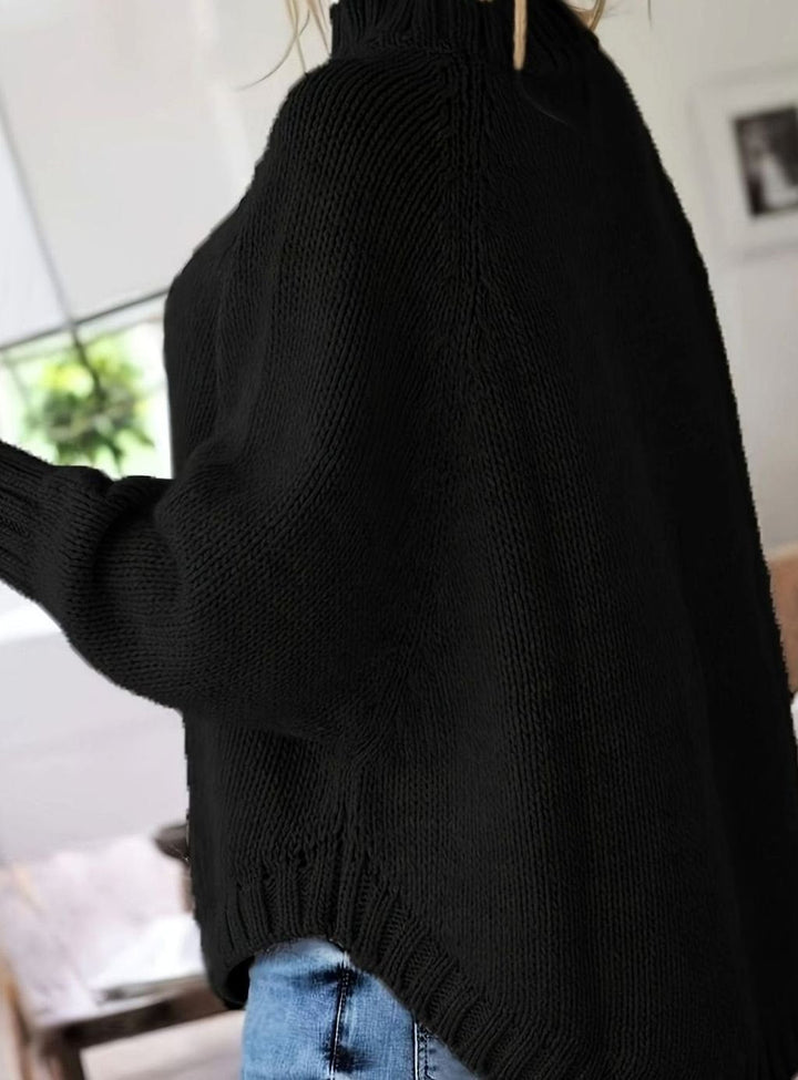Suéter trenzado de mujer, corte oversize, cuello alto, diseño elegante para el frío.