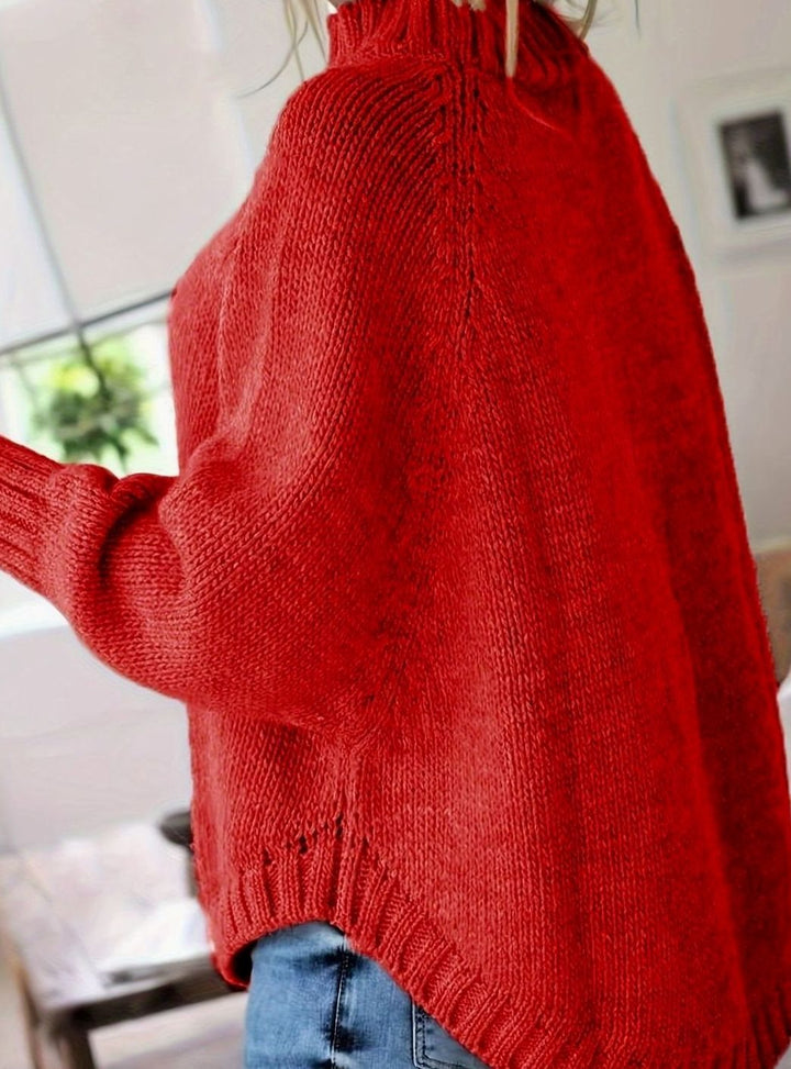 Jersey de punto para mujer, oversize y cuello alto, con detalles trenzados, confort y estilo.