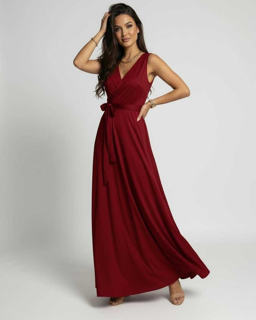 Ropa de fiesta elegante: Vestido largo rojo vibrante para mujer, estilo envolvente y sin mangas para un look único.