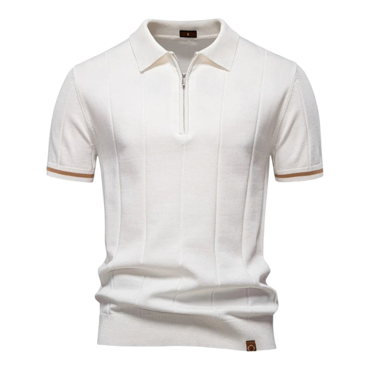 Polo elegante de punto para hombre, cuello con cremallera. Confort transpirable y estilo casual.
