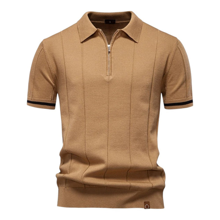 Polo de punto para hombre, elegante y transpirable. Cuello con cremallera para un toque moderno.