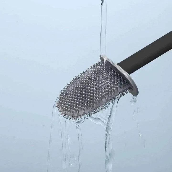 Solución de limpieza: escobilla flexible para inodoro con soporte, garantiza higiene y accesibilidad en el baño.