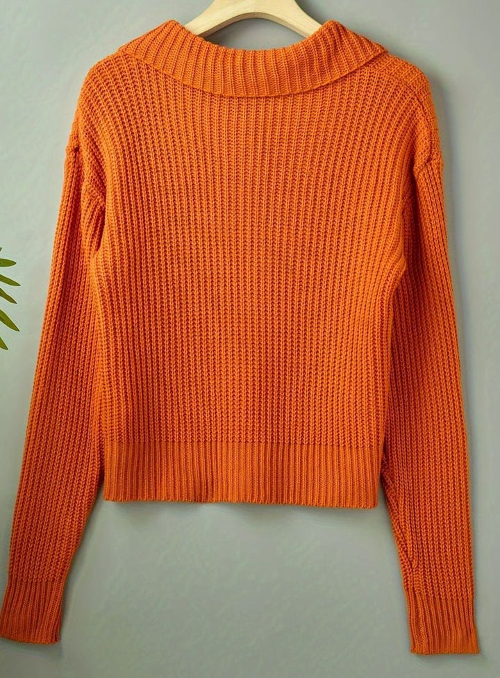 Jersey de punto canalé para mujer, cuello solapa relajado. Estilo casual y elegante para otoño-invierno.