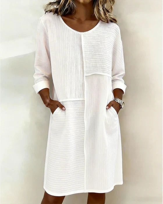 Vestido de mujer de algodón y lino texturizado, estilo suelto ideal para verano.