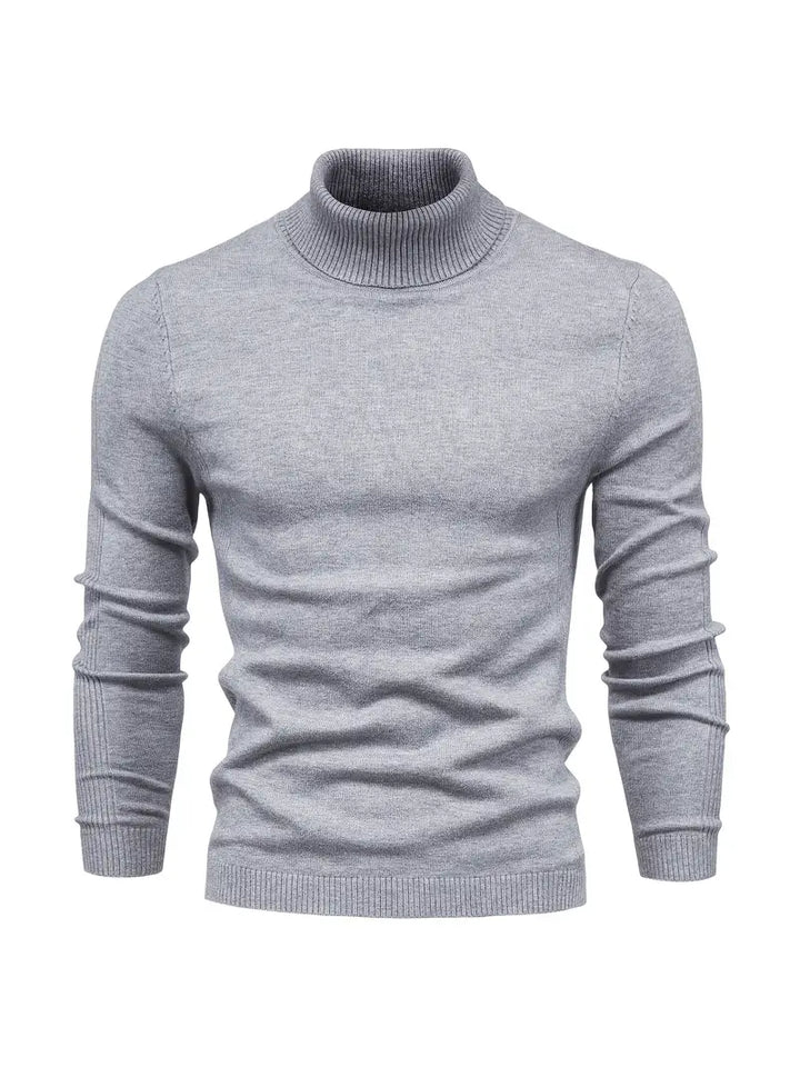 Suéter negro de cuello alto slim fit para hombre LUCA. Versátil y moderno, ideal para look casual o elegante.