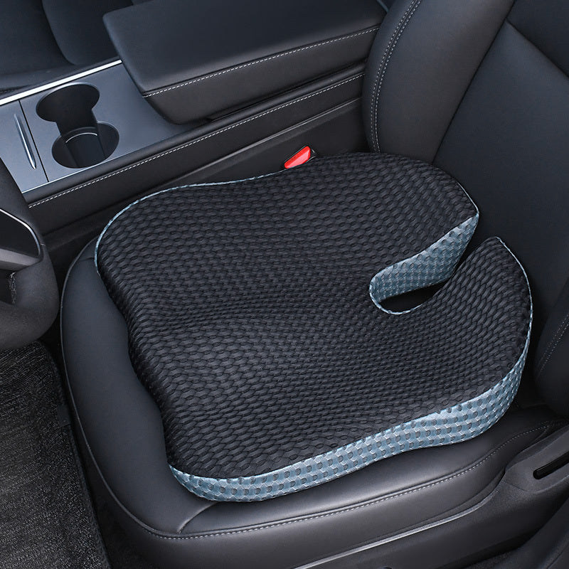 Diseño ergonómico del cojín Triacomfort para asiento, ideal para alivio del coxis y la espalda.