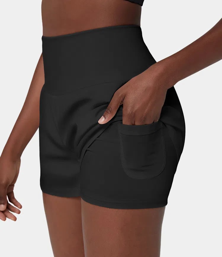 Short deportivo transpirable para mujer, cintura alta, con bolsillos laterales.