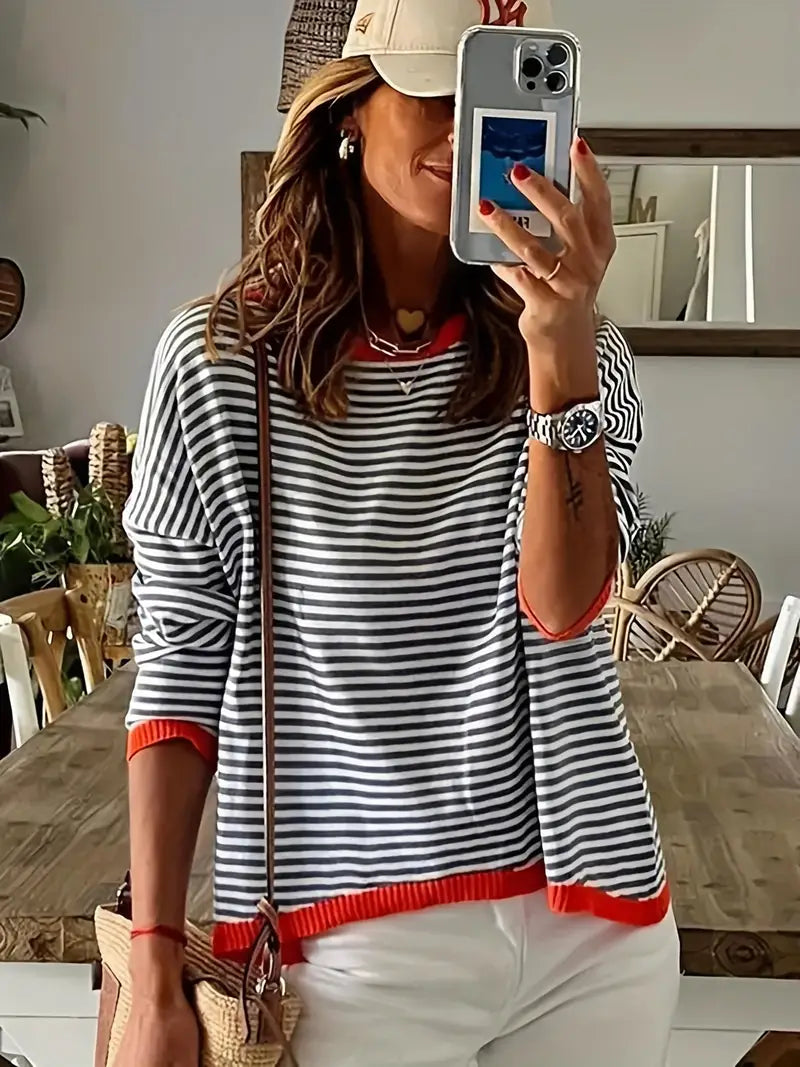 Jersey de mujer cómodo a rayas, con diseño de hombros caídos y bloques de color. Perfecto para invierno.