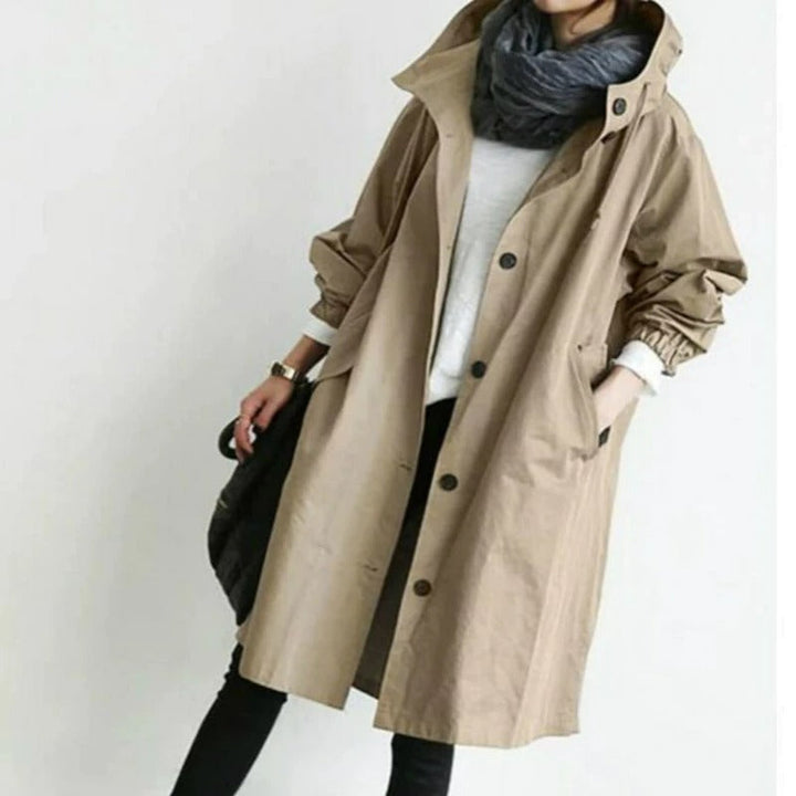 Gabardina impermeable de mujer, un abrigo elegante y versátil con cinturón, ideal para moda urbana de otoño.