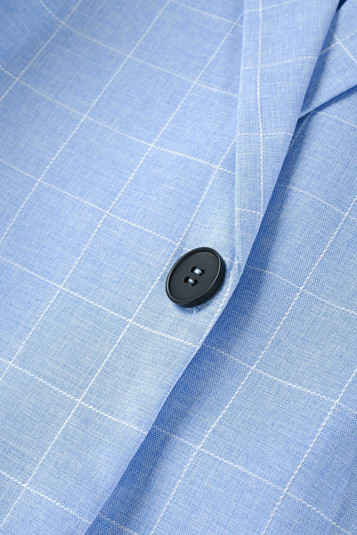 Americana hombre azul con cuadros, ligera, ideal para un look casual elegante y cómodo.