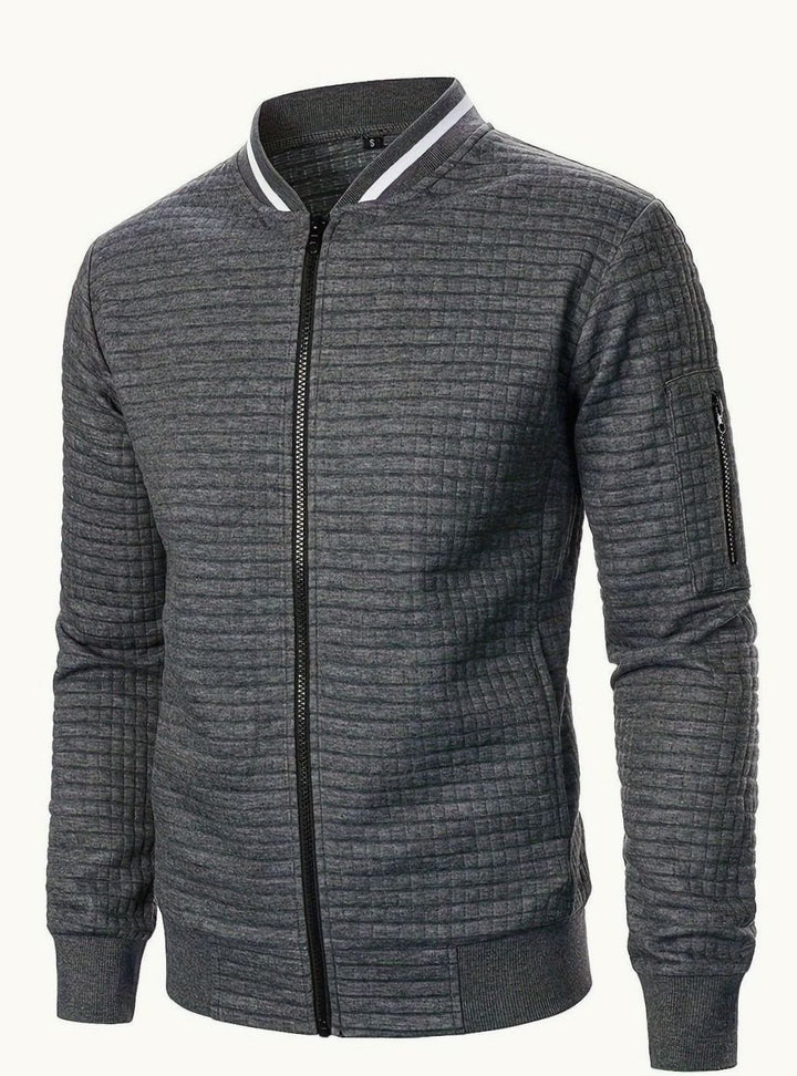 Chaqueta bomber de hombre, con textura de cuadros, perfecta para estilo casual.