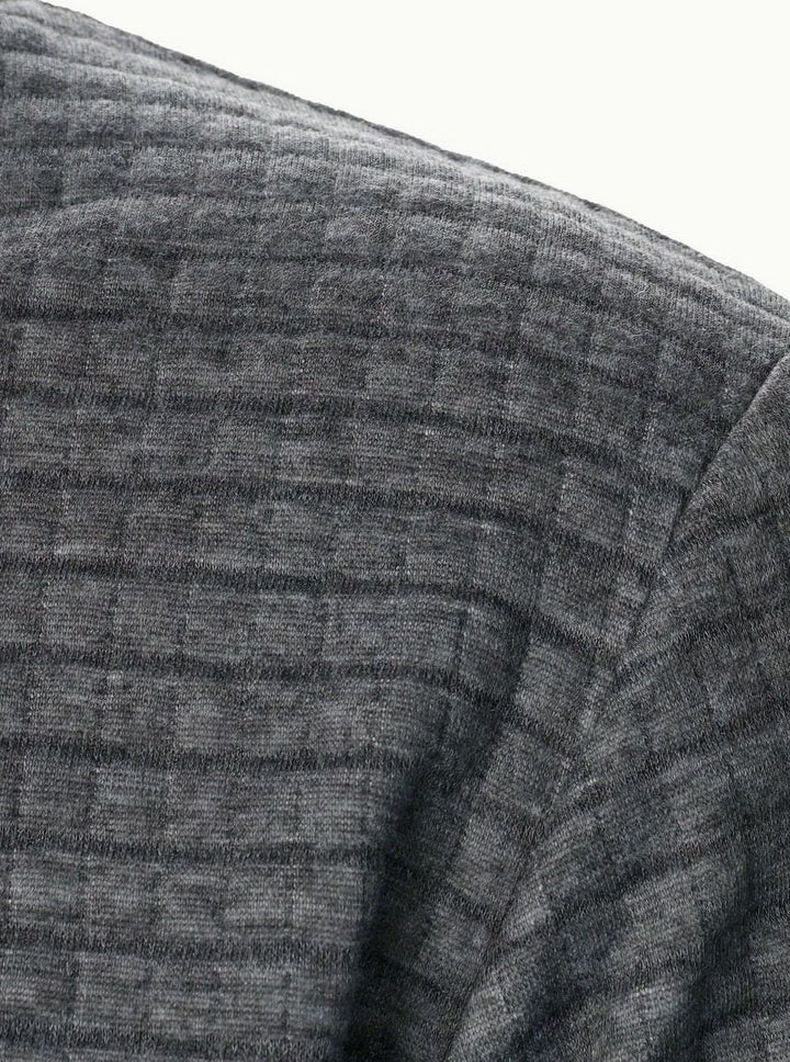 Bomber masculina casual, con textura de cuadros, para un look urbano y moderno.
