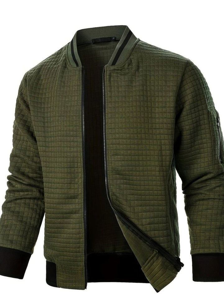 Cazadora hombre, bomber texturizada de cuadros, versátil para entretiempo.