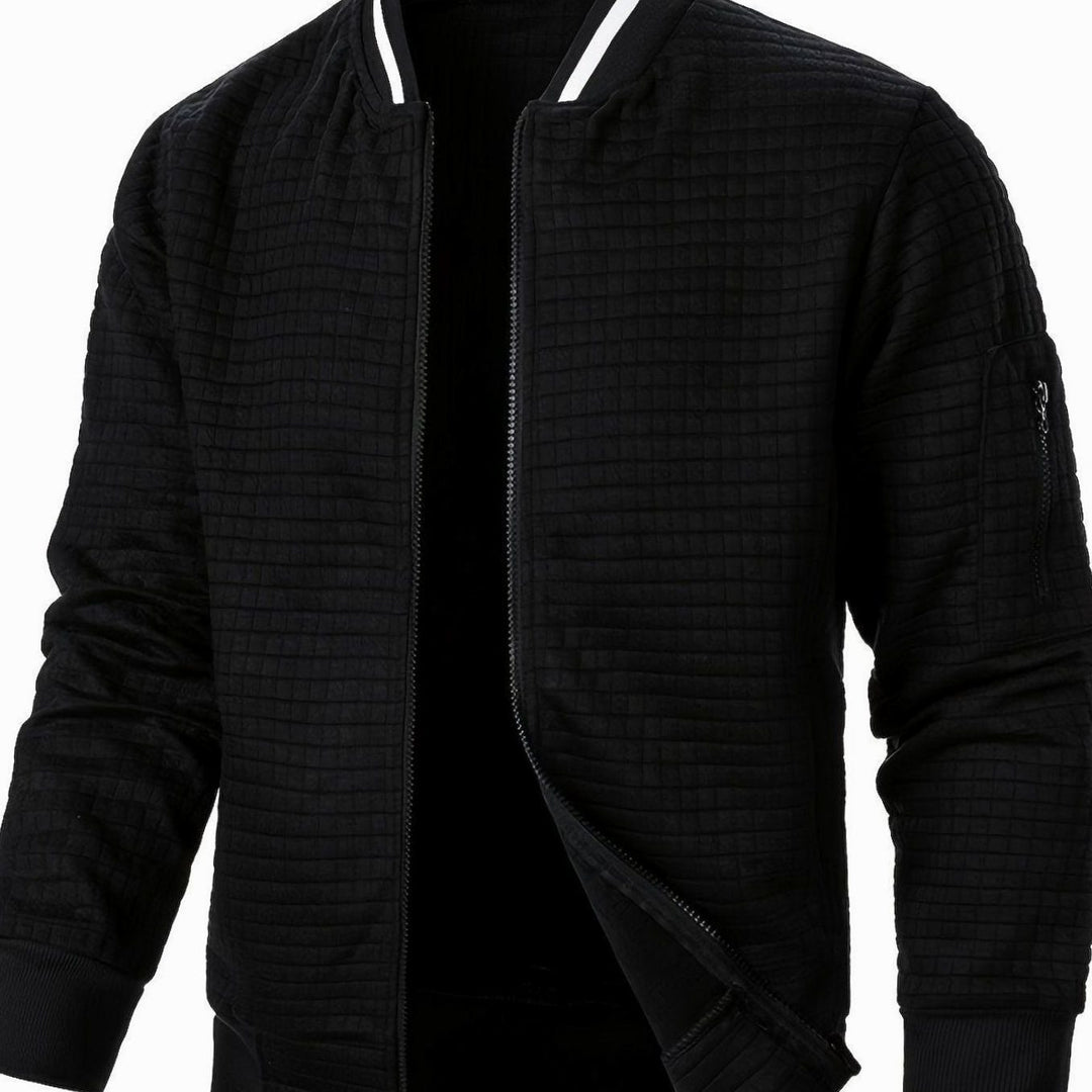 Cazadora urbana para hombre, bomber con textura de cuadros y cierre de cremallera.